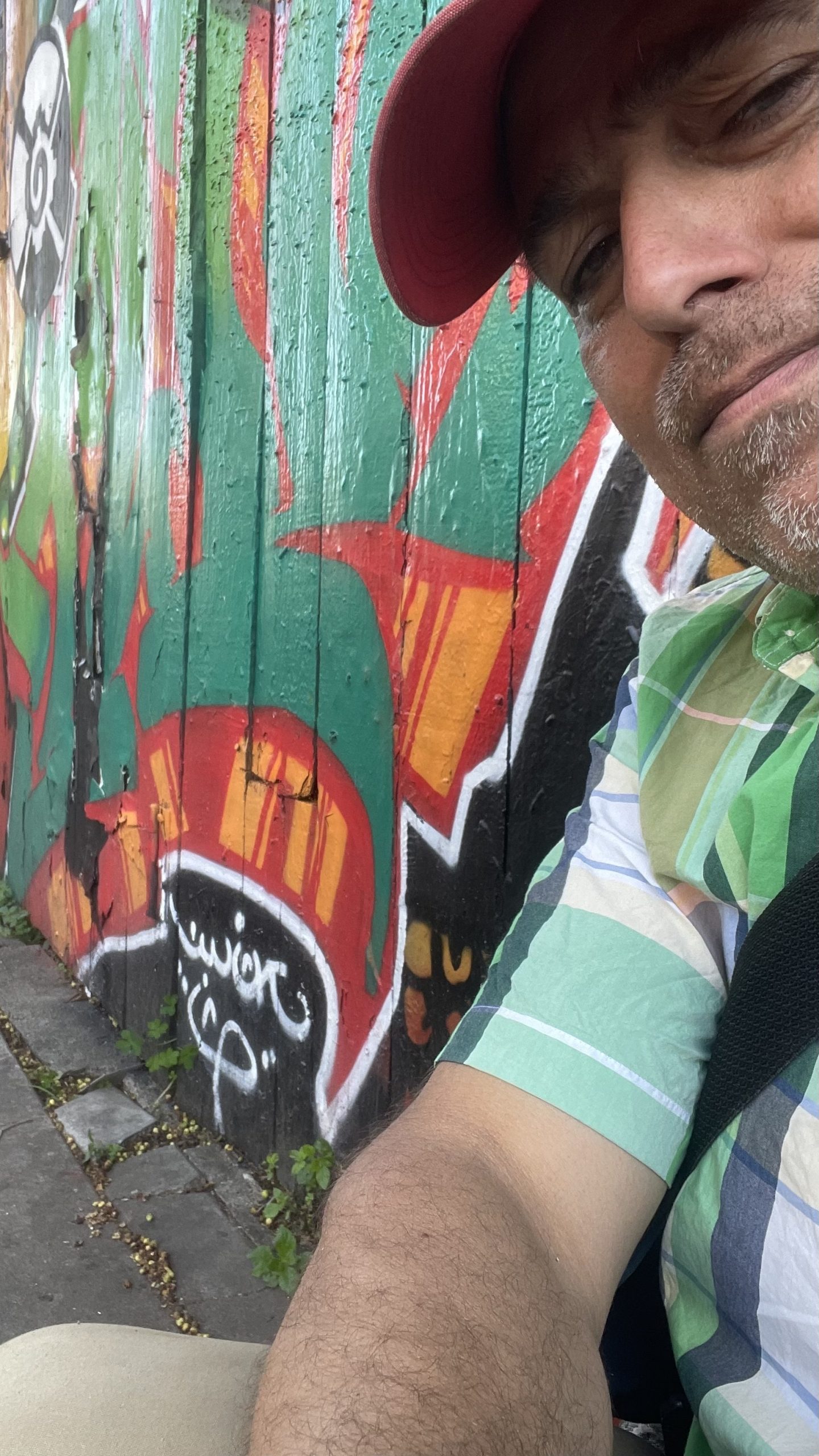 selfie on the street with murals